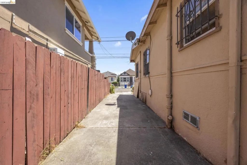 Concrete walkway providing access to property