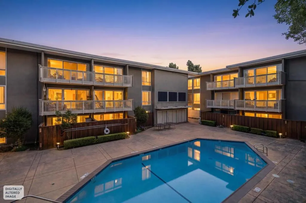 Twilight view of pool