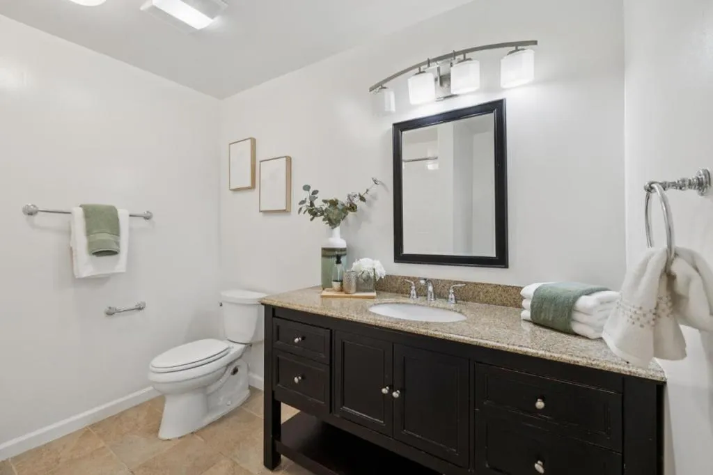 Hallway bathroom with large vanity