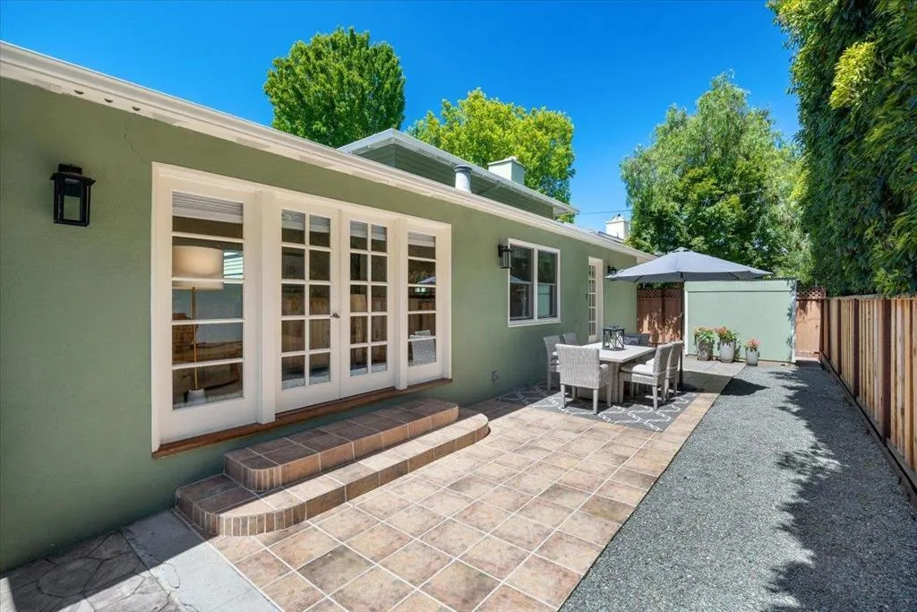 1058 yard with sitting + dining and gardening area.Shed at end of yard
