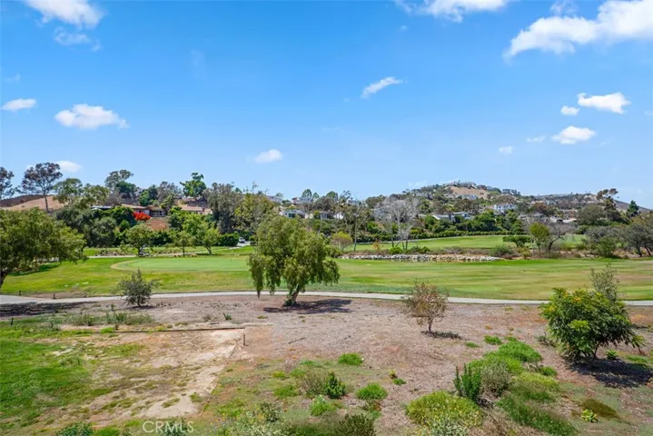 A front-row seat to lush fairways, mature trees, and rolling hills, this is the view you'll never tire of coming home to.