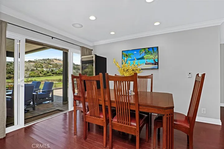 Enjoy beautiful golf course views from the dining area, with sliding doors opening to the covered patio.
