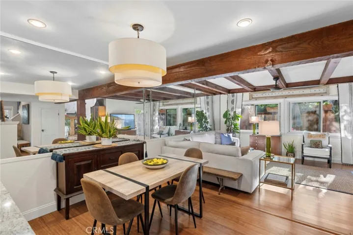 Dining area overlooks the living room and sits just steps from the kitchen for easy gatherings.