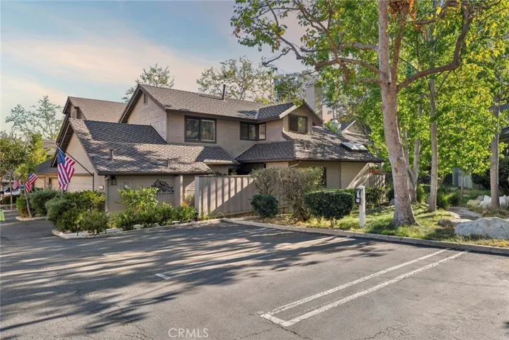 Desirable end-unit location with an attached two-car garage and guest parking nearby.