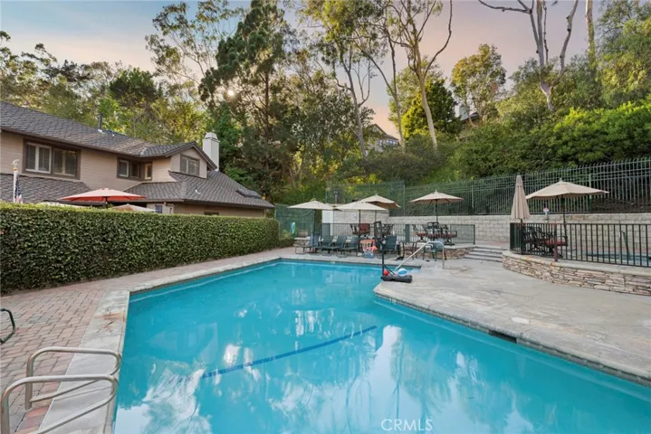 Spend sunny afternoons at the community pool and spa, surrounded by mature trees and resort-style gathering spaces designed for relaxing with neighbors and friends.
