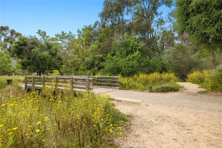 One of Canyon Park's charming wooden bridges connects you to miles of walking and biking trails.