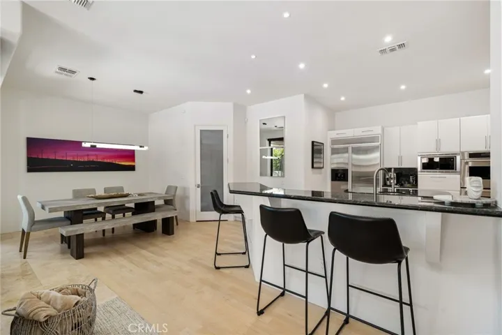 Open Family Room into Kitchen