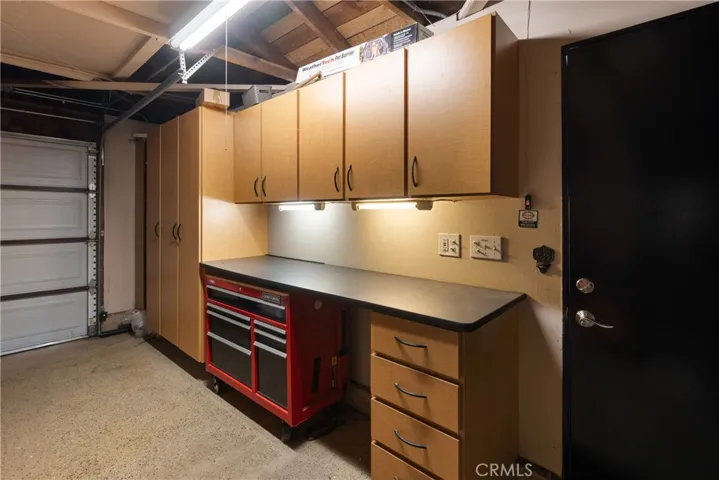Finished Garage with upgraded built-in cabinetry,