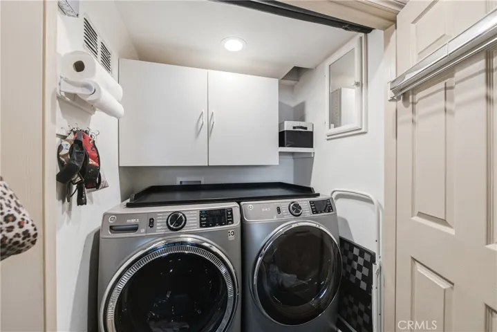 Laundry w/ laundry chute from upstairs primary bath!