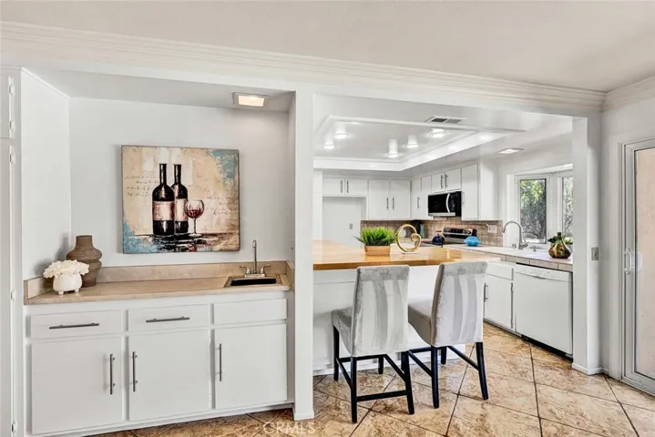 The built-in wet bar creates an ideal space for entertaining