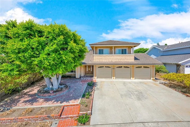 Home is complete with a three-car garage for added convenience and storage