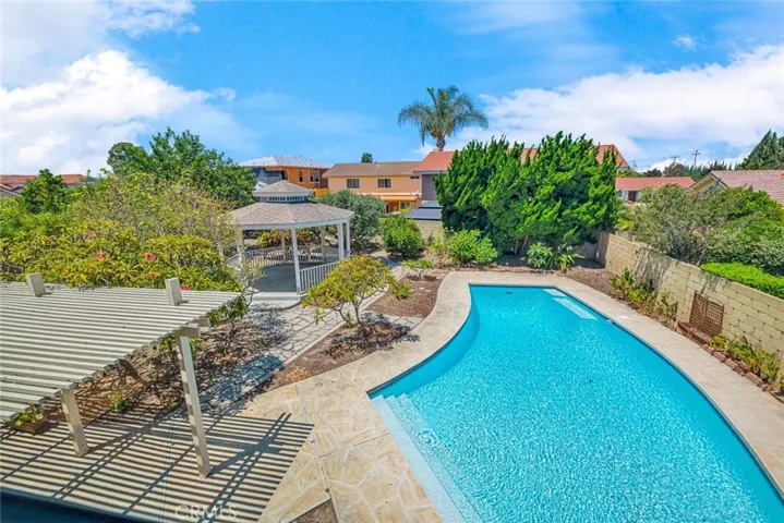 Soak up the sunshine while relaxing by the sparkling pool