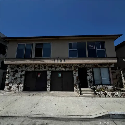 FRONT OF COMPLEX.
