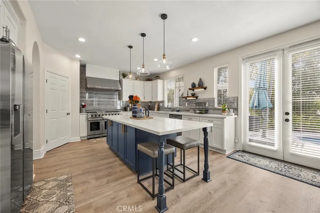 Kitchen island.  French doors to backyard.