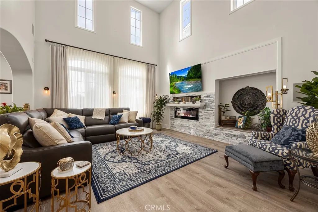 Living room with fireplace.  (Digitally enhanced fire).