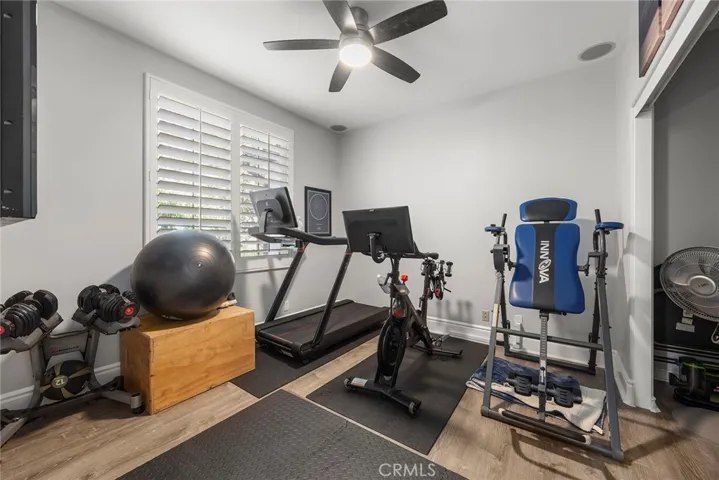 Bedroom #4, downstairs, currently used as workout room.