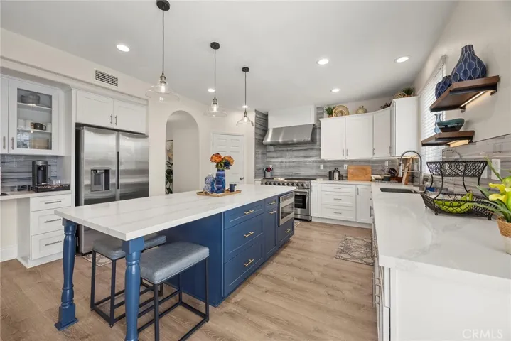 Kitchen area with views to backyard.