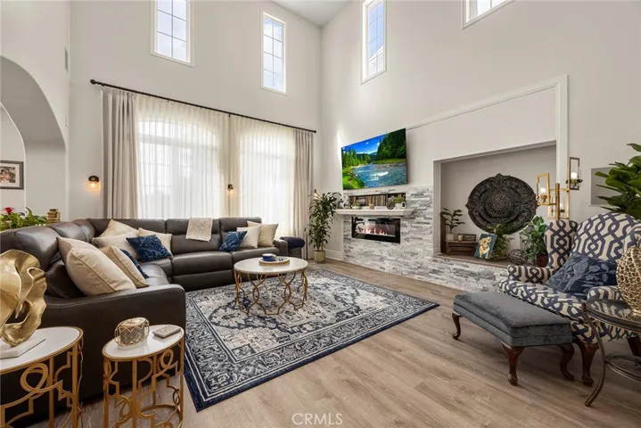 Living room with fireplace.  (Digitally enhanced fire).