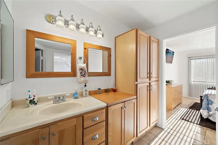 The large bathroom with extra storage