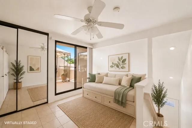 The upstairs loft has a closet and could be made more private - this is the 2nd bedroom option. Virtually staged.