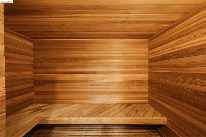 Wood-lined interior featuring horizontal plank walls and ceiling