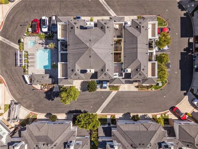 Birds-eye perspective captures the balance of private patios and shared green
space.