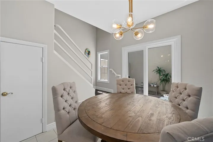 Sliding doors lead from dining to private patio.