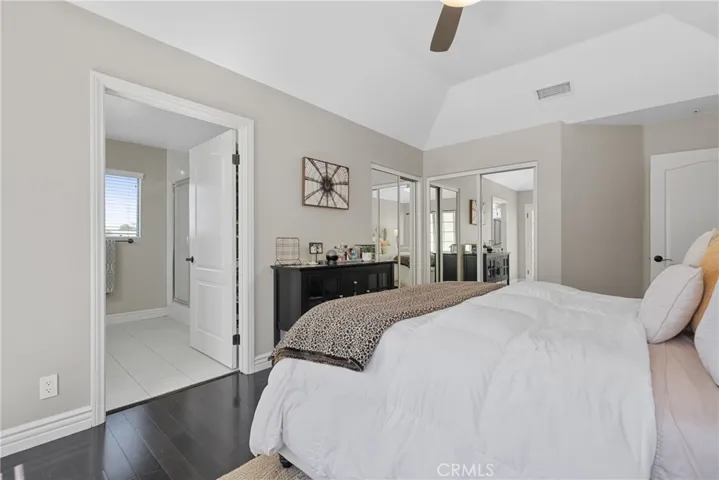 Mirrored closet doors add depth and light.