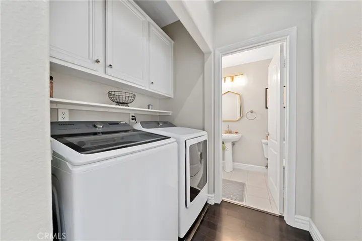 Laundry closet with 220V hookups on the second level.