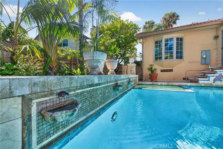Oversized Beautiful Pool, roomy spa and 3 decorative waterfalls in pool.