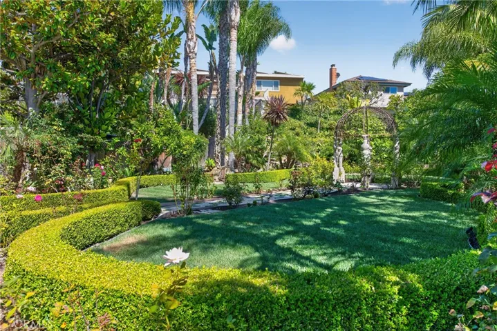 Huge back yard garden organic sanctuary/refuge filled exquisite, lush and vibrant plants and flowers