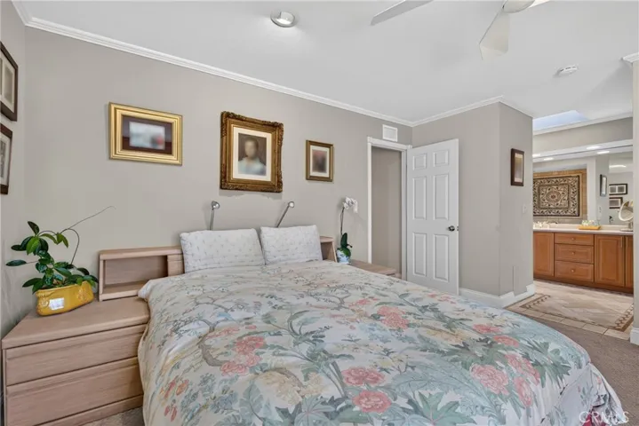 Master suite has walk in closet, spa tub and separate mosaic tiled shower with massage water features.