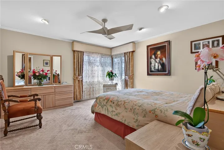 Master suite has walk in closet, spa tub and separate mosaic tiled shower with massage water features.