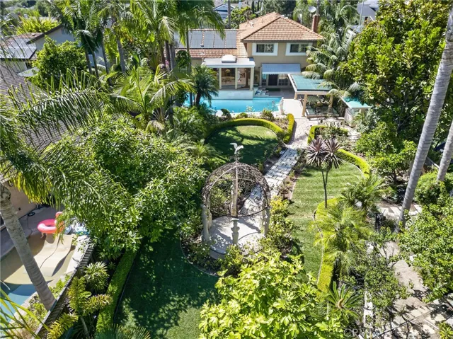 Huge back yard garden organic sanctuary/refuge filled exquisite, lush and vibrant plants and flowers