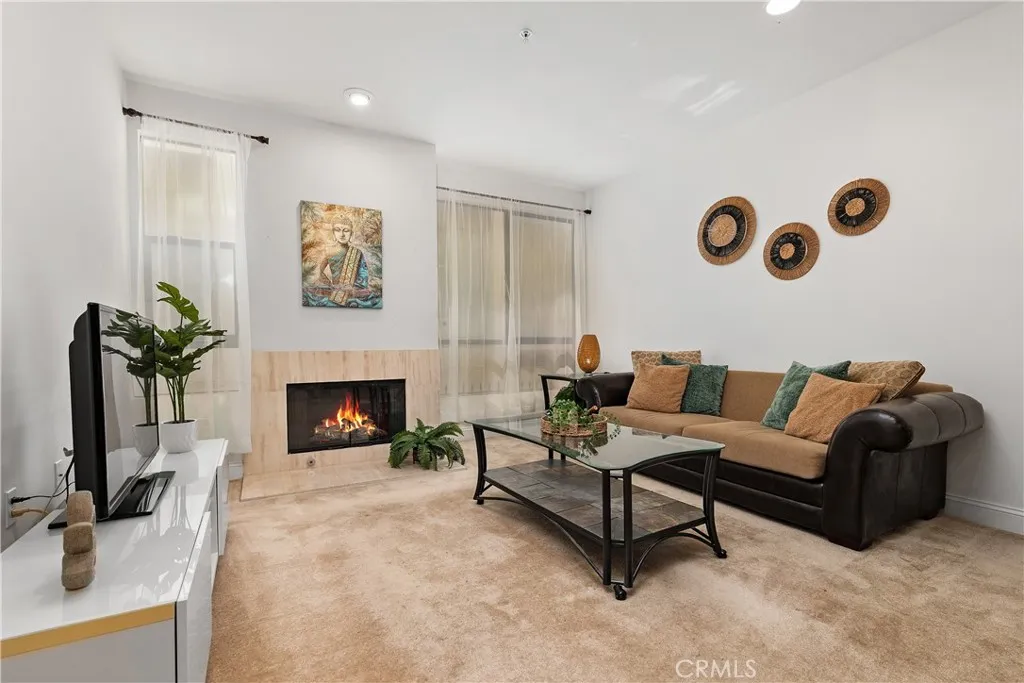 COZY FIREPLACE BENEATH HIGH CEILINGS