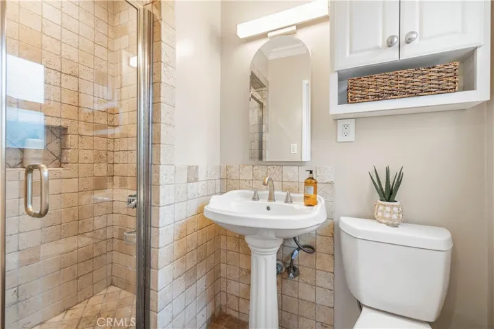 Bathroom 1 with nearby access to the pool area