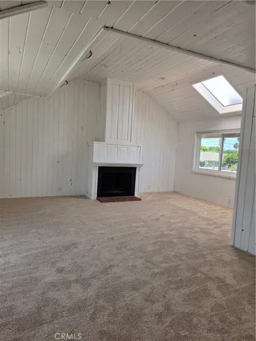 Huge family room is so light and bright.