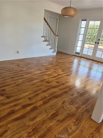 Dining room has a view through gorgeous French doors