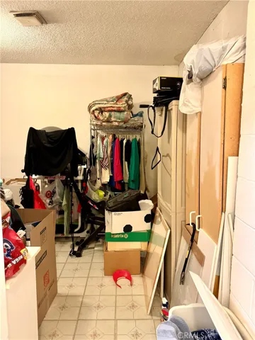 Another view of the storage  in laundry area.