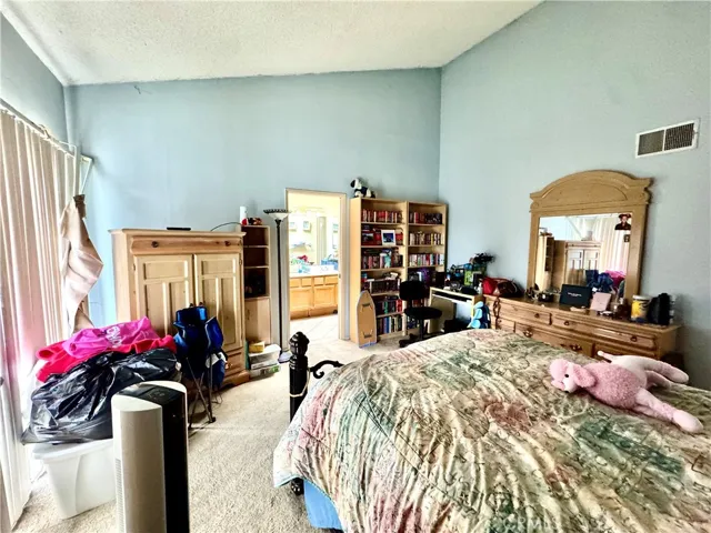 Another view of the primary bedroom.
