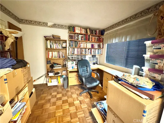 Den or could be 3rd bedroom or open wall to extend kitchen