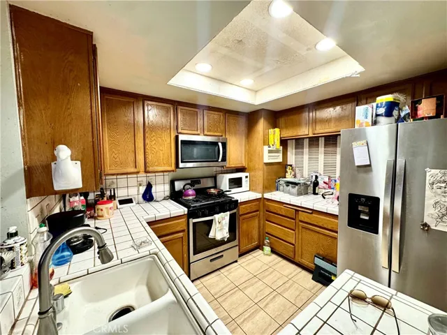 Others have extended the kitchen to the den opening it up