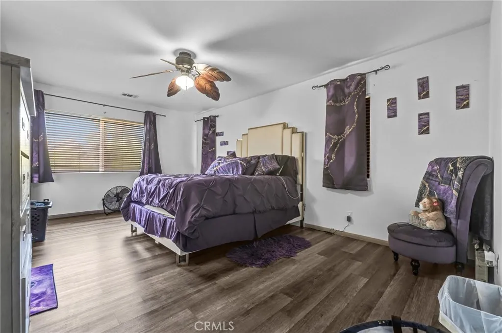 main bedroom with private full bathtub & bathroom