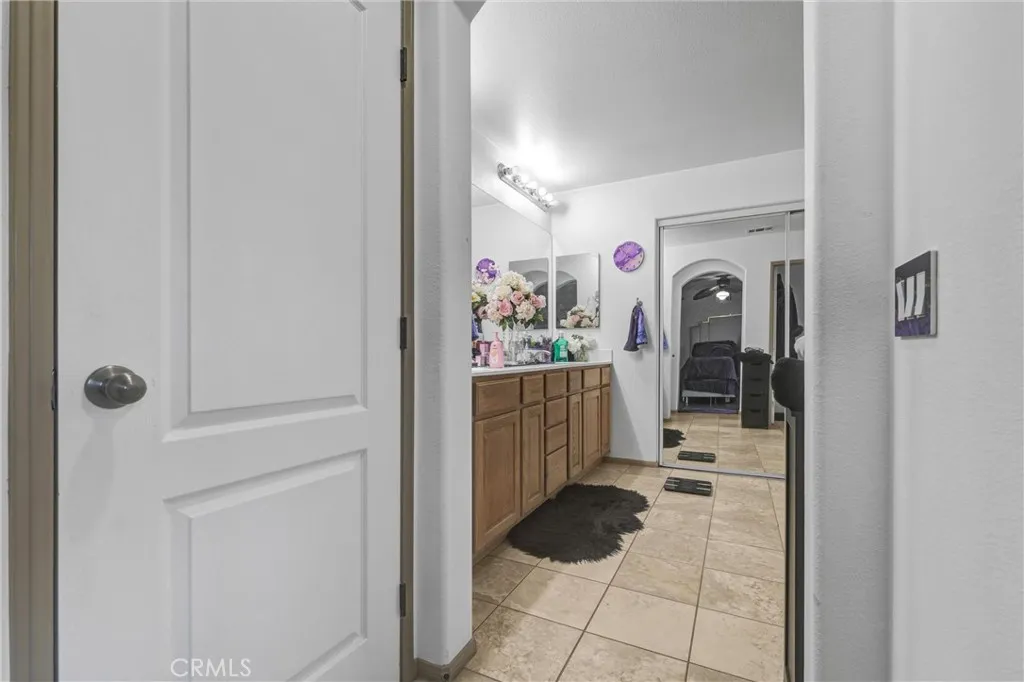 bathroom with extra storage inside master bedroom