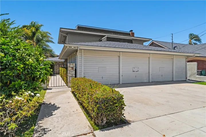Large garage with 3 separate doors.