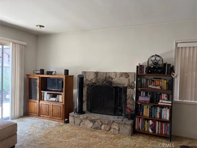 Front unit 361 with family room, fireplace and sliding glass door.