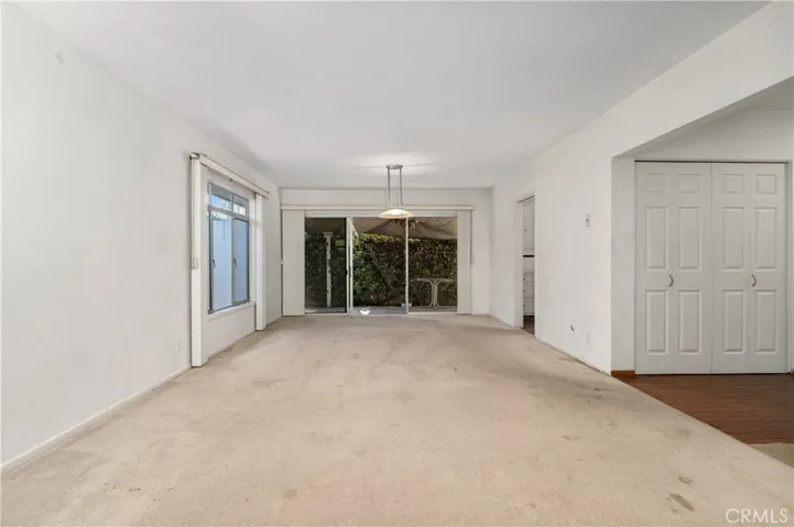 Large living room with sliding glass doors