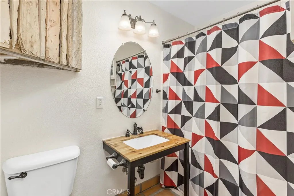 Shared full bath with shower/tub combo