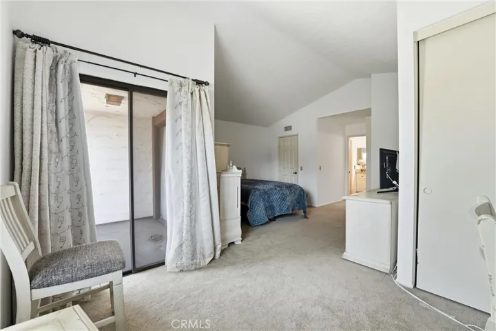 Primary Bedroom with Private Balcony.