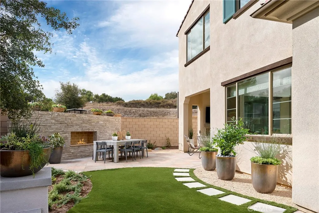 Model Photos: Photos shown are of the model home for this floor plan. Actual finishes, features, and landscaping may vary.